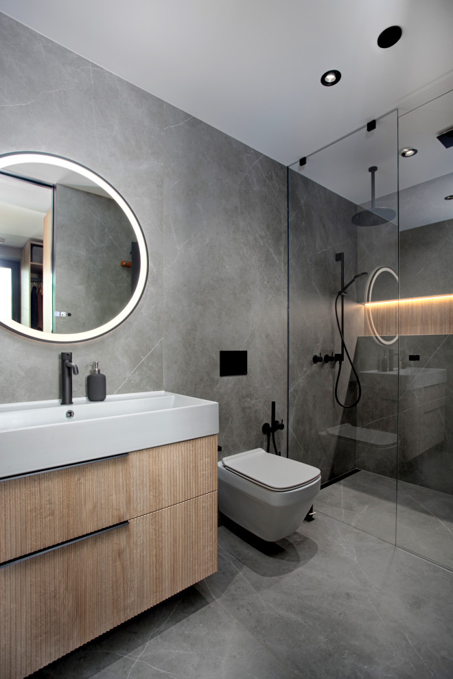 Mid-sized contemporary master bathroom in Other with beige cabinets, gray tile, ceramic tile, grey walls, ceramic floors, grey floor, a single vanity, a floating vanity and flat-panel cabinets.