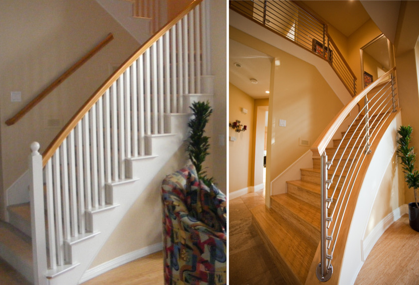 This is an example of a contemporary wood curved staircase in Orange County with painted wood risers and wood railing.