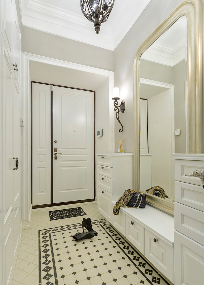 This is an example of a transitional front door in Moscow with grey walls, a double front door, a white front door and multi-coloured floor.