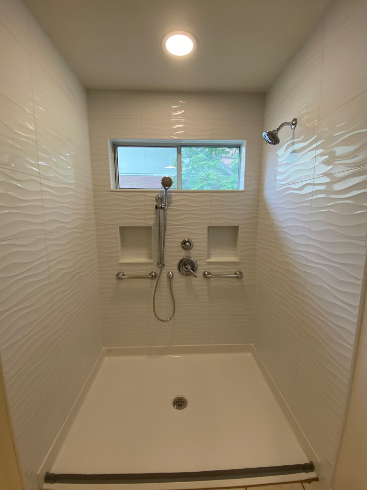 Inspiration for a mid-sized contemporary master white tile and ceramic tile bathroom remodel in Austin with a niche