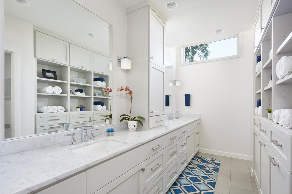 Mid-sized contemporary master bathroom in Austin with shaker cabinets, grey cabinets, a curbless shower, white tile, marble, white walls, ceramic floors, an undermount sink, engineered quartz benchtops, grey floor, an open shower and white benchtops.