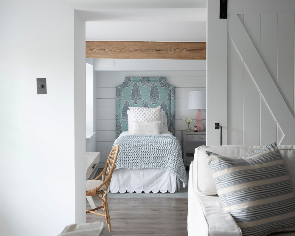 Design ideas for a mid-sized country kids' room for girls in Philadelphia with grey walls, medium hardwood floors, grey floor and planked wall panelling.
