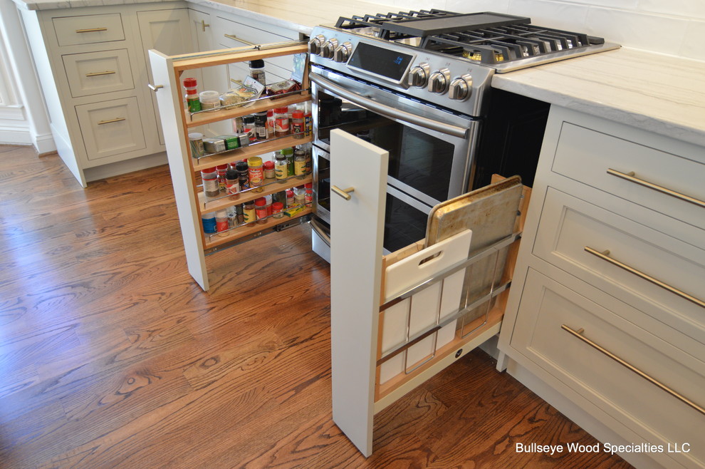 Eat-in kitchen - large transitional u-shaped medium tone wood floor and brown floor eat-in kitchen idea in DC Metro with a single-bowl sink, shaker cabinets, gray cabinets, quartzite countertops, white backsplash, ceramic backsplash, stainless steel appliances, an island and white countertops