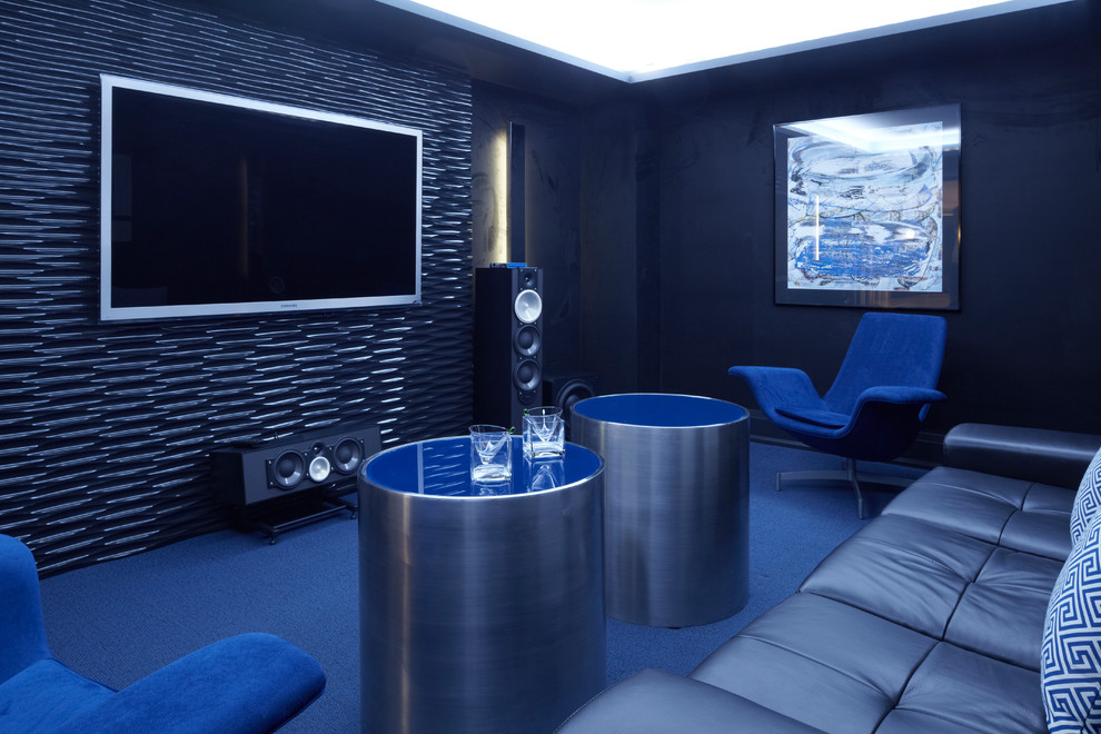 Mid-sized transitional enclosed home theatre in Toronto with blue walls, carpet, a built-in media wall and multi-coloured floor.