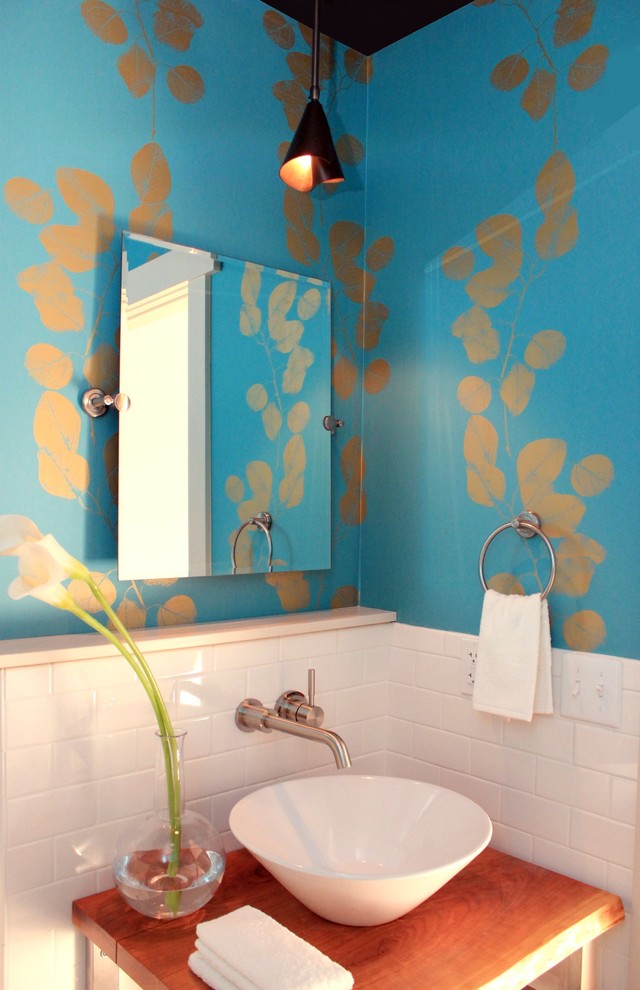 Inspiration for a transitional bathroom remodel with wood countertops and blue walls