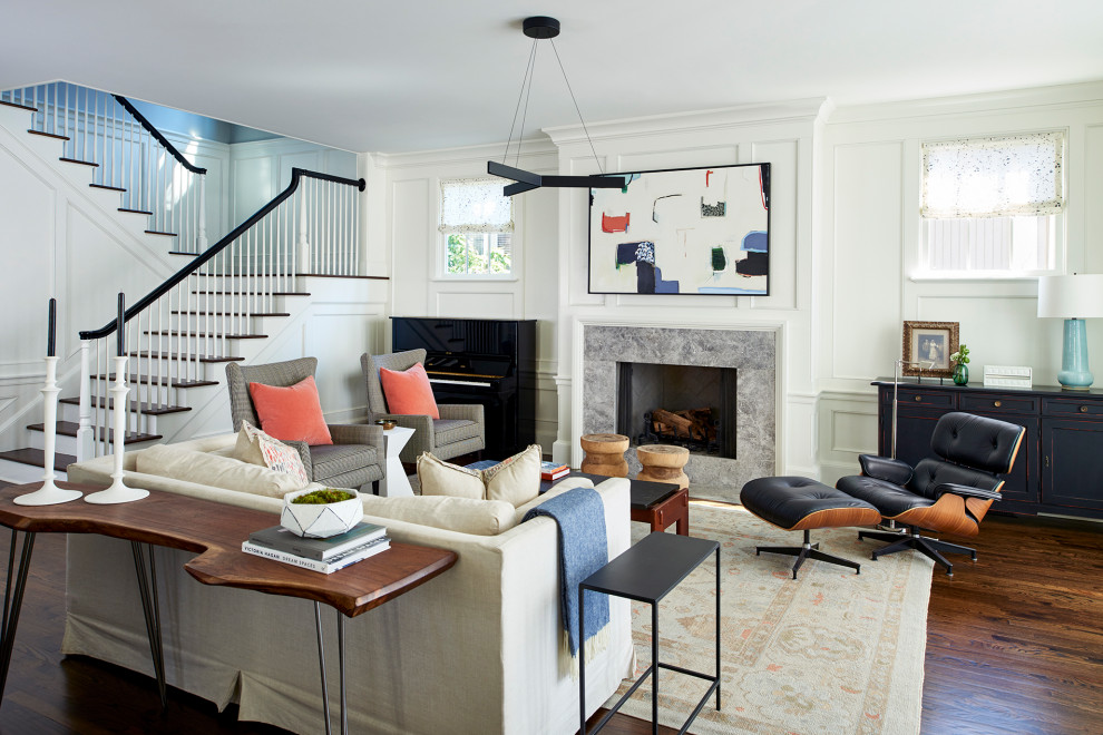 Inspiration for a mid-sized transitional open concept family room in Atlanta with white walls, dark hardwood floors, a standard fireplace, a stone fireplace surround, no tv, brown floor and panelled walls.