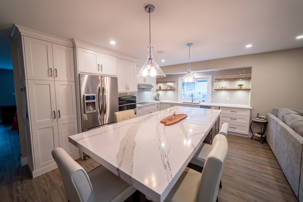 Example of a transitional kitchen design in Toronto
