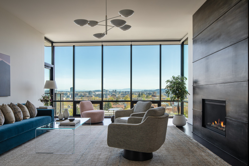 Design ideas for a modern living room in Portland with a metal fireplace surround.