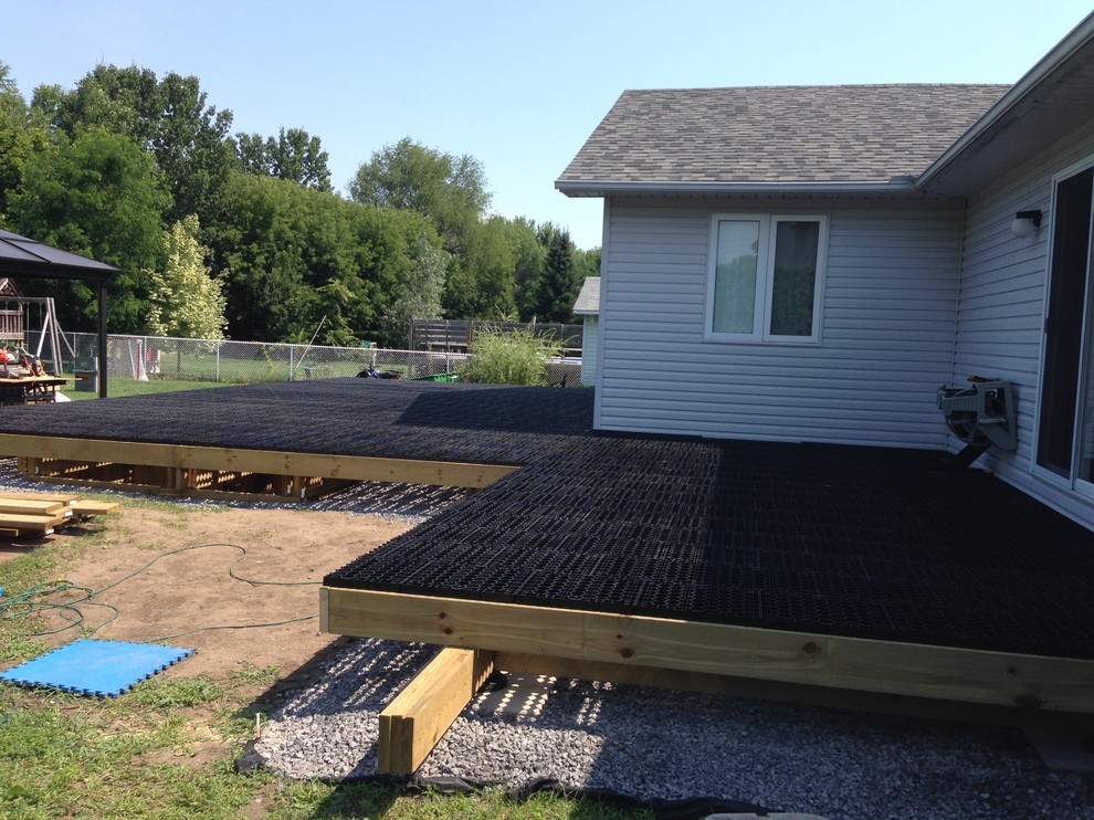 Deck - huge transitional backyard deck idea