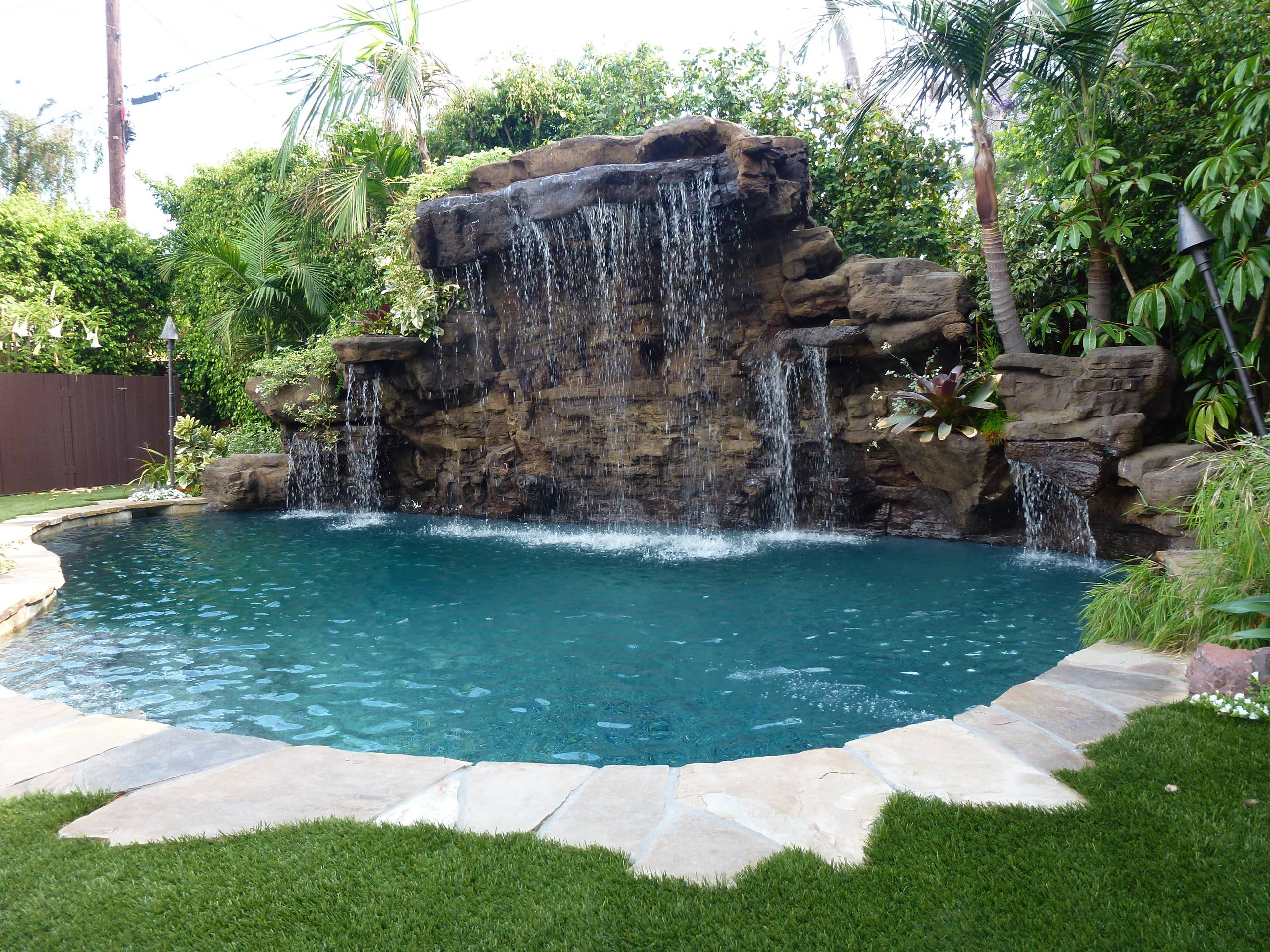 Before & After - Naturalistic Pool with waterfalls & movie screen in West LA, CA