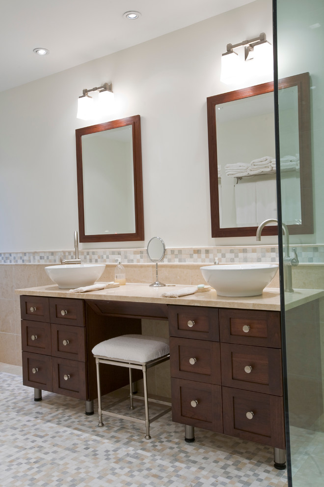 Large contemporary master bathroom in Bridgeport with furniture-like cabinets, dark wood cabinets, marble benchtops, a vessel sink, a freestanding tub, a curbless shower, a two-piece toilet, beige tile, porcelain tile, white walls and mosaic tile floors.