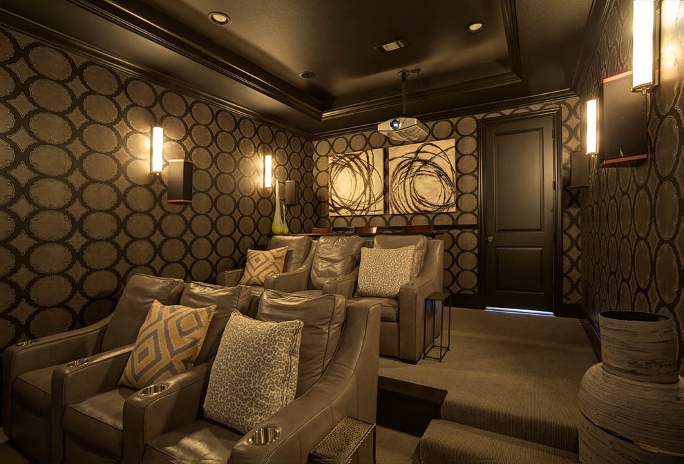 This is an example of a mediterranean open concept home theatre in Dallas with beige walls, carpet, grey floor and a projector screen.