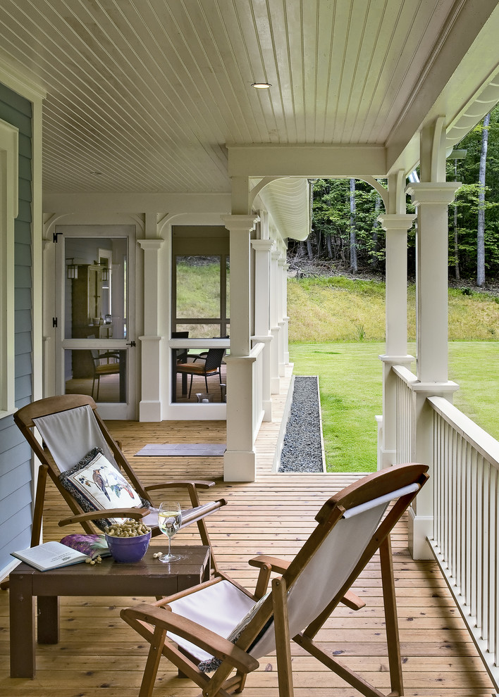 Photo of a traditional verandah in New York with decking and a roof extension.