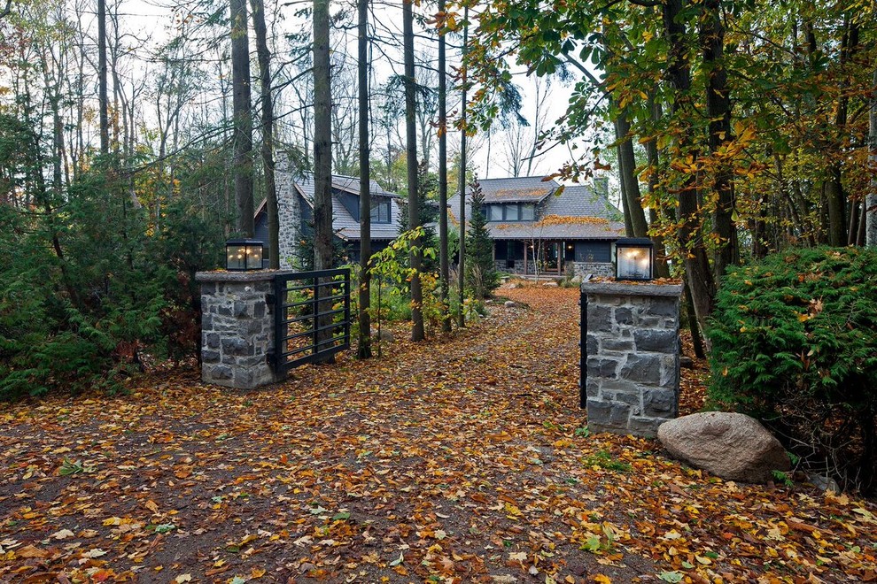 Example of a transitional exterior home design in Toronto