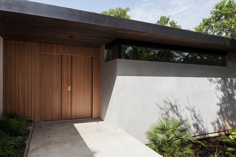 This is an example of a midcentury exterior in Austin.