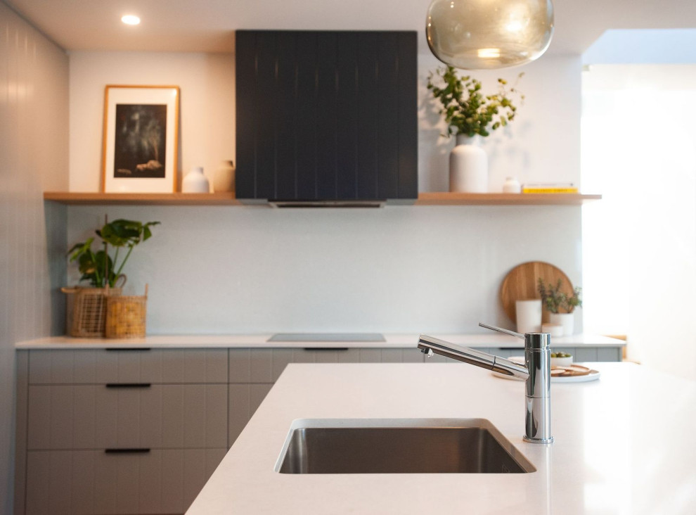 Design ideas for a beach style kitchen in Central Coast.
