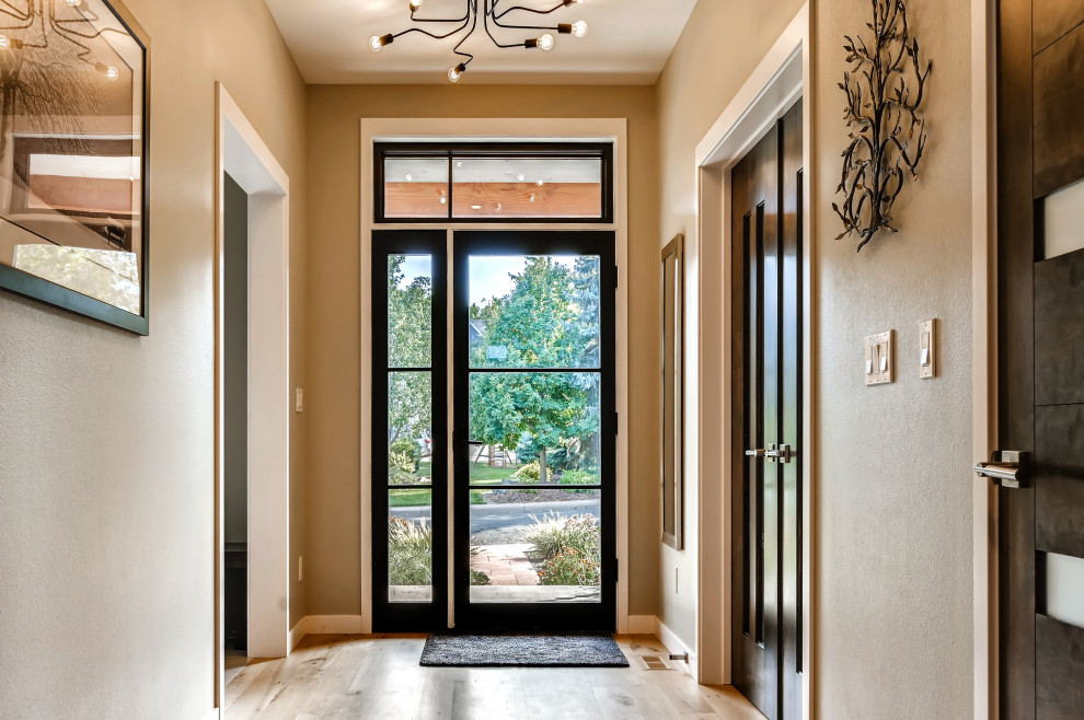 This is an example of a medium sized contemporary entrance in Denver.