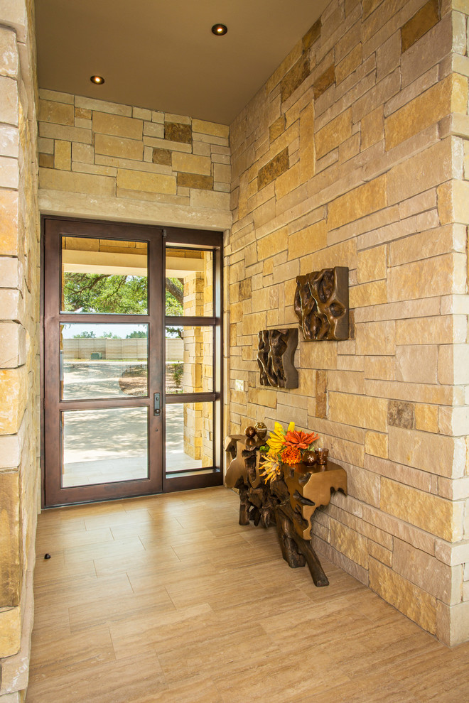 Example of a mountain style entryway design in Austin