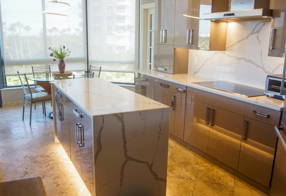 This is an example of a mid-sized contemporary galley eat-in kitchen in Tampa with a single-bowl sink, flat-panel cabinets, grey cabinets, quartz benchtops, white splashback, stainless steel appliances and with island.