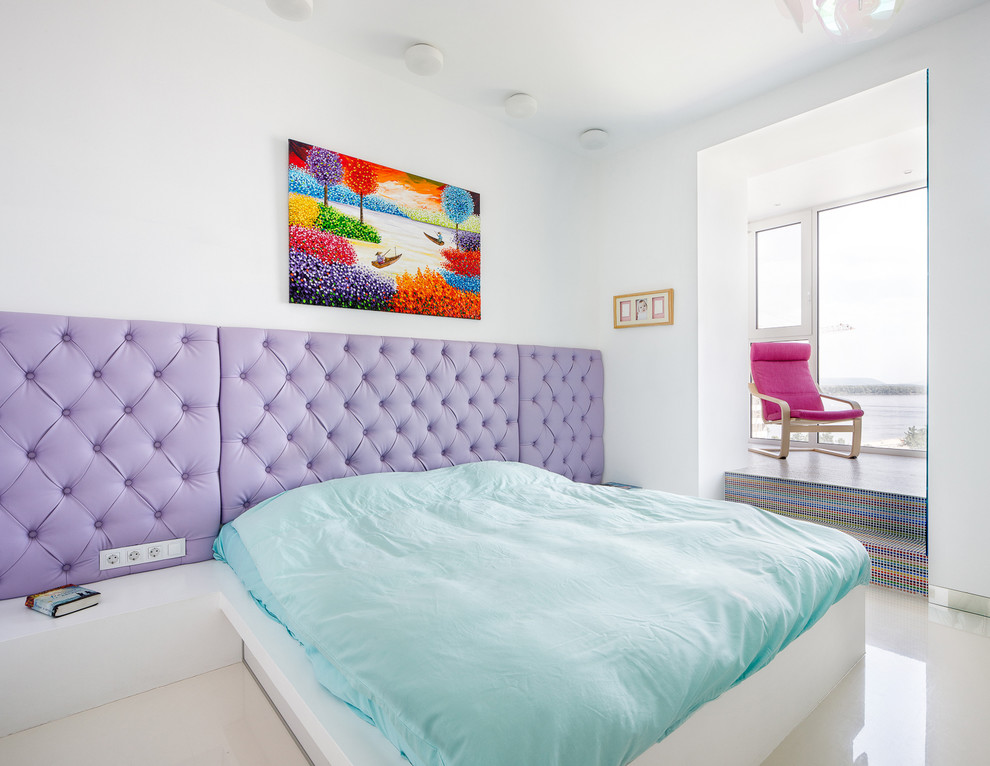 Photo of a contemporary master bedroom in Other with white walls.