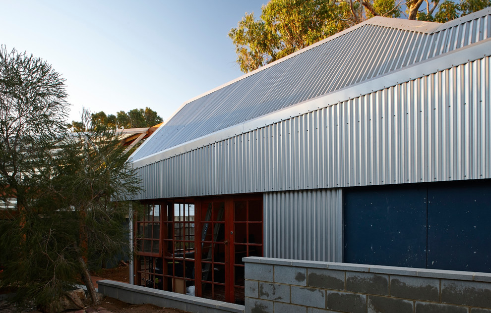 Industrial grey exterior in Perth with metal siding.