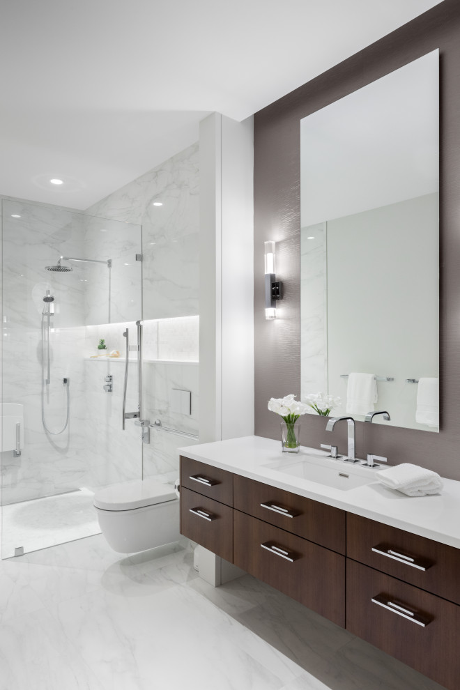 Design ideas for a large modern 3/4 bathroom in Vancouver with flat-panel cabinets, a drop-in tub, white tile, marble, multi-coloured walls, a drop-in sink, engineered quartz benchtops, multi-coloured floor, a hinged shower door, white benchtops, a single vanity and a built-in vanity.
