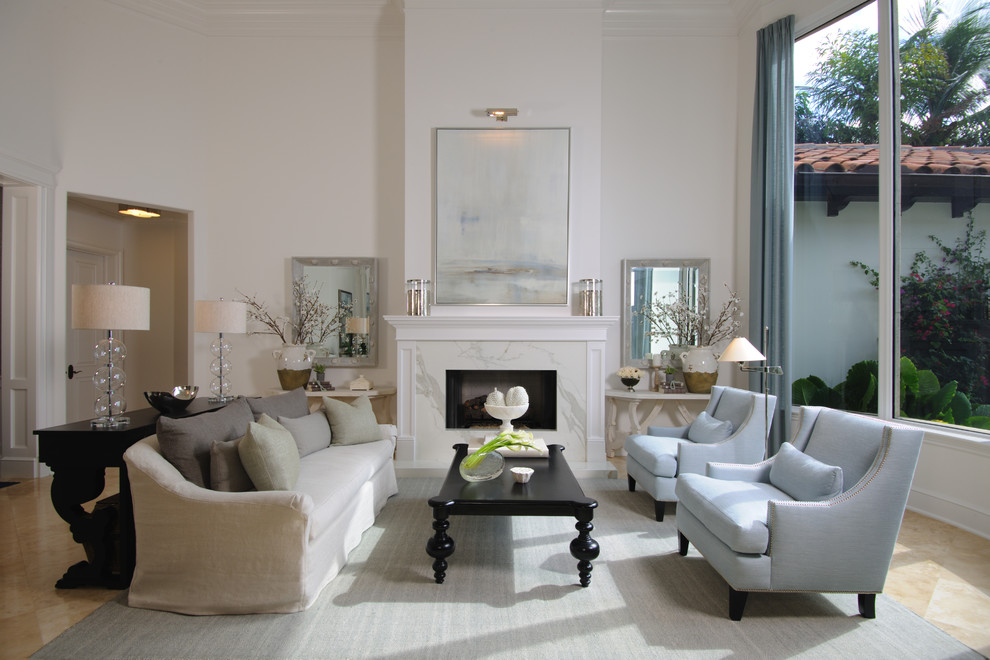 Photo of a transitional formal living room in Miami with white walls, a standard fireplace, a stone fireplace surround and beige floor.