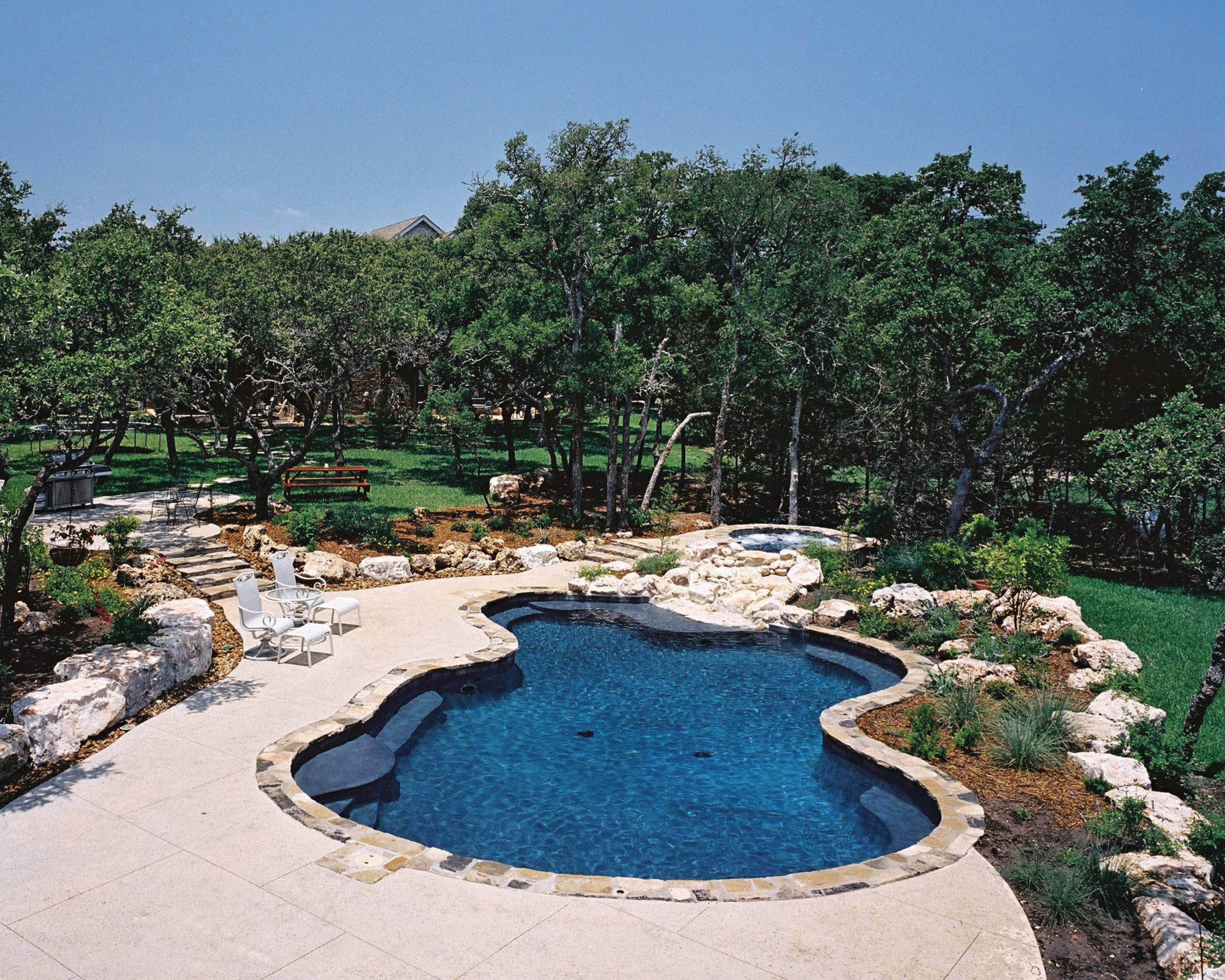 Natural Shape Swimming Pool/Spa Waterfall in Boerne Texas