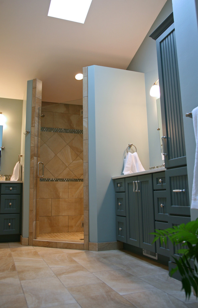 Large traditional master bathroom in Milwaukee with recessed-panel cabinets, green cabinets, an alcove shower, a one-piece toilet, multi-coloured tile, mosaic tile, green walls, an undermount sink, quartzite benchtops, beige floor, a hinged shower door and beige benchtops.