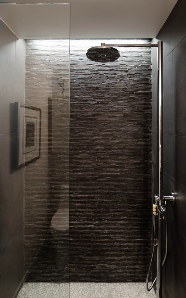Contemporary bathroom in Houston with an alcove shower, gray tile, pebble tile floors and slate.