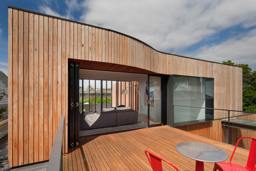 This is an example of a large contemporary deck in Melbourne with no cover.