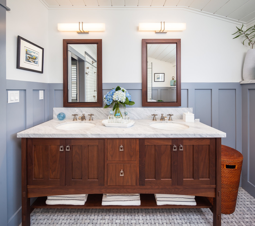 Arts and crafts bathroom in San Diego with shaker cabinets, medium wood cabinets, an open shower, a two-piece toilet, grey walls, mosaic tile floors, an undermount sink, marble benchtops, grey floor, an open shower and white benchtops.