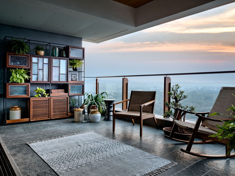 Design ideas for a contemporary balcony in Pune.