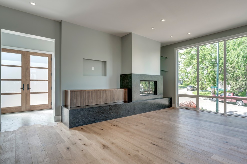 Transitional home design photo in Calgary