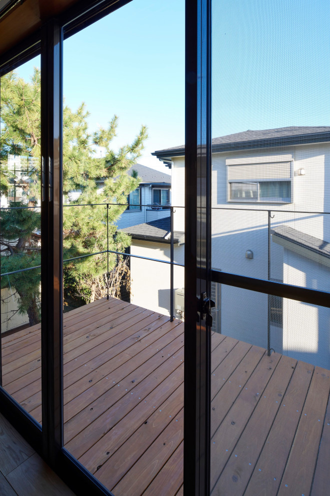 Design ideas for a medium sized metal railing balcony in Other with no cover.