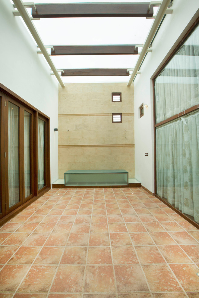 This is an example of a contemporary patio in Bengaluru.