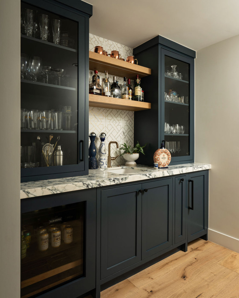Built In Home Bar with Navy Cabinets, Marble Countertop and Open Wood ...