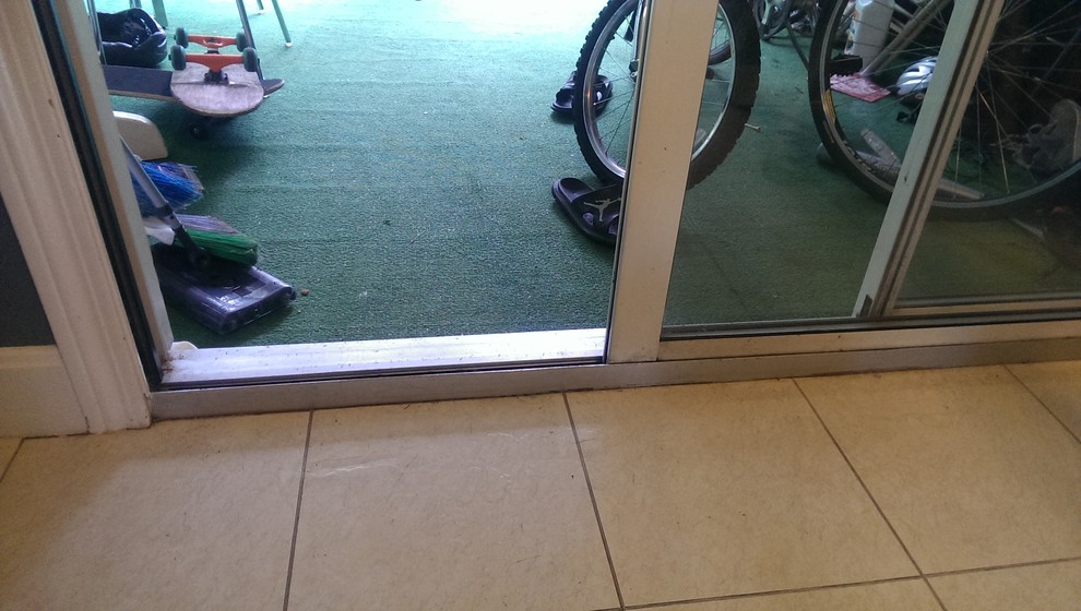 Need to remove glass sliding door so I can replace rollers