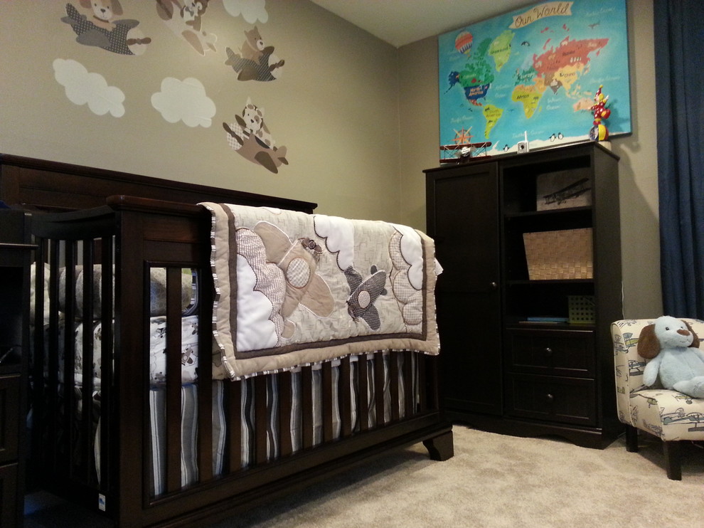 Photo of a mid-sized modern nursery for boys in Philadelphia with grey walls and carpet.