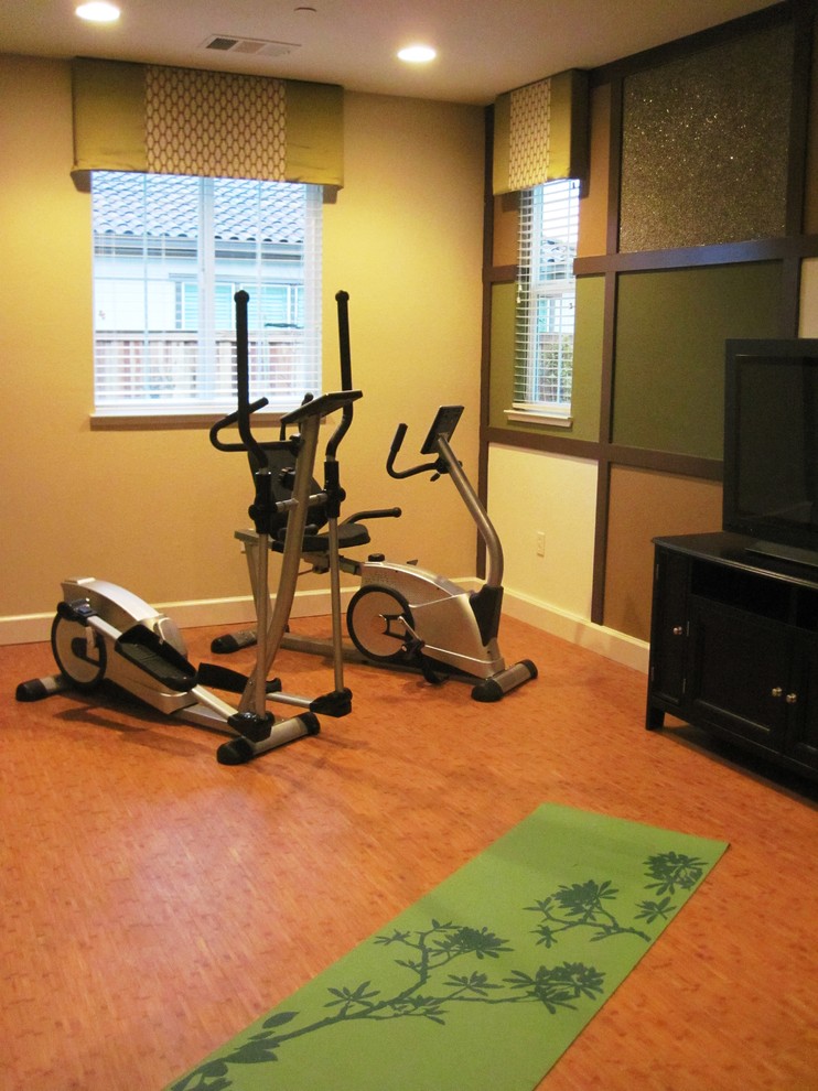 Design ideas for a contemporary home gym in San Francisco with orange floor.