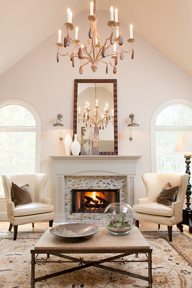 Photo of a traditional living room in Atlanta with a tile fireplace surround.