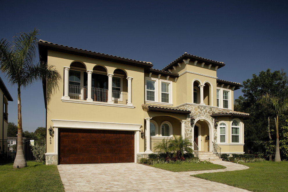 Photo of a mediterranean home design in Tampa.