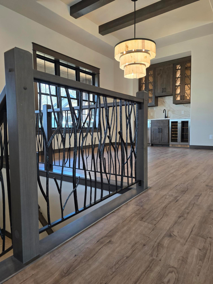 Mid-sized transitional metal railing staircase photo