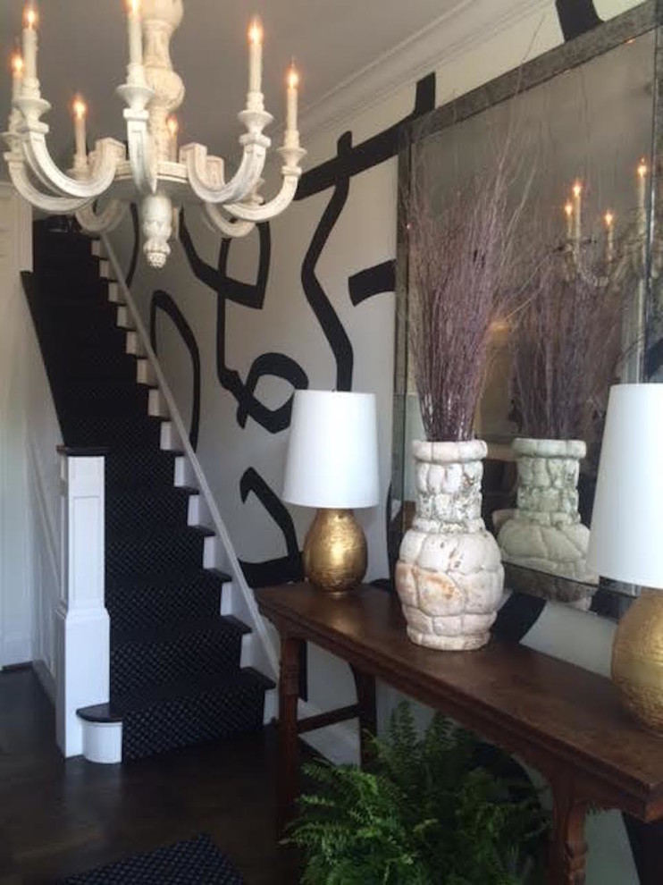 Example of a large transitional dark wood floor hallway design in DC Metro with white walls