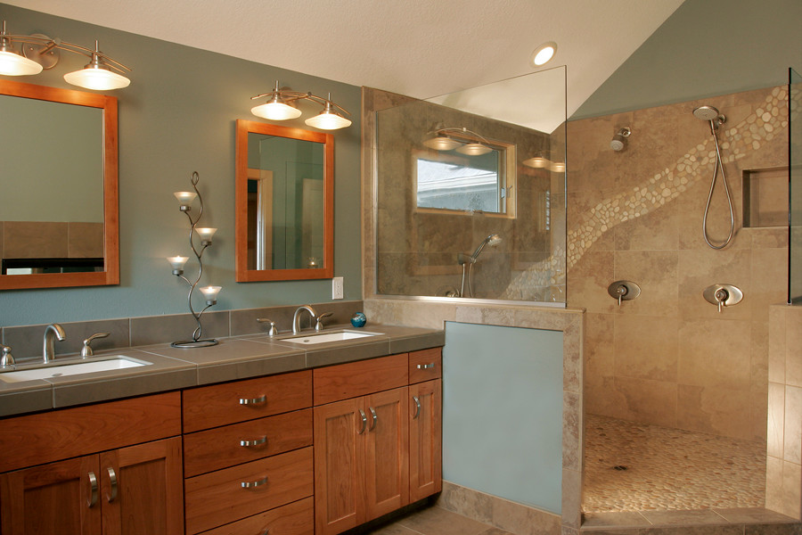 Mid-sized transitional master bathroom in Portland with an alcove shower, green walls, ceramic floors, an undermount sink, shaker cabinets and medium wood cabinets.