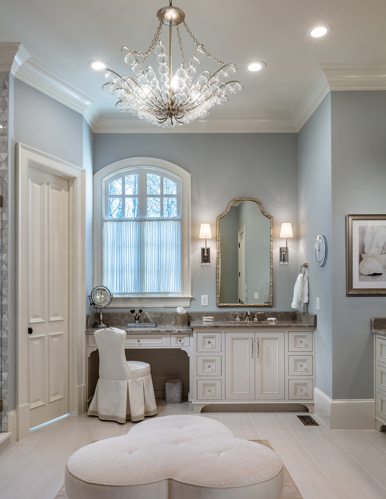 Design ideas for a large traditional master bathroom in Atlanta with beige cabinets, grey walls, porcelain floors, an undermount sink, quartzite benchtops, beige floor, recessed-panel cabinets and grey benchtops.