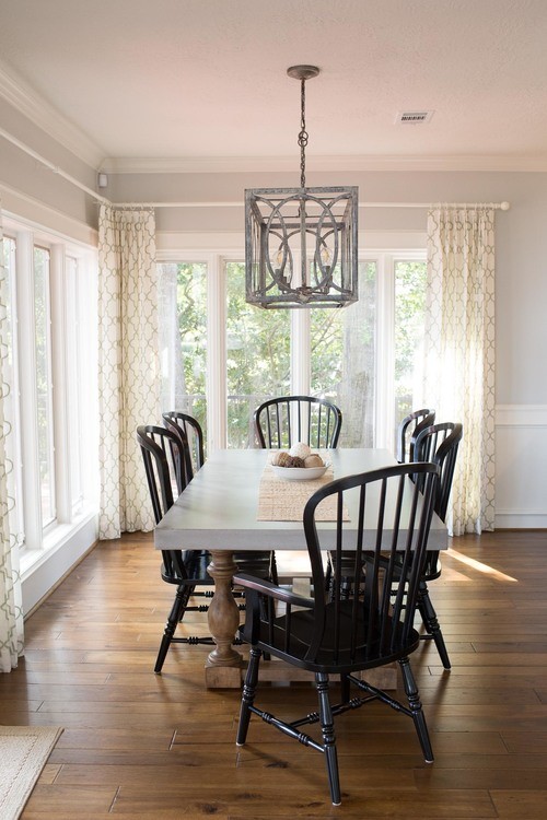 Transitional dining room in Houston.