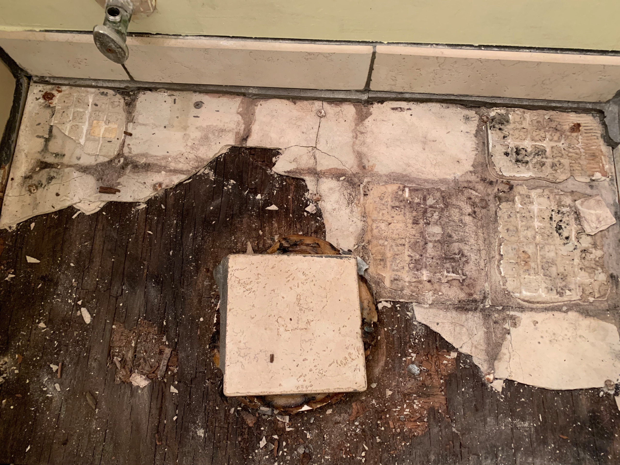 Tile damaged requiring removal and replacement