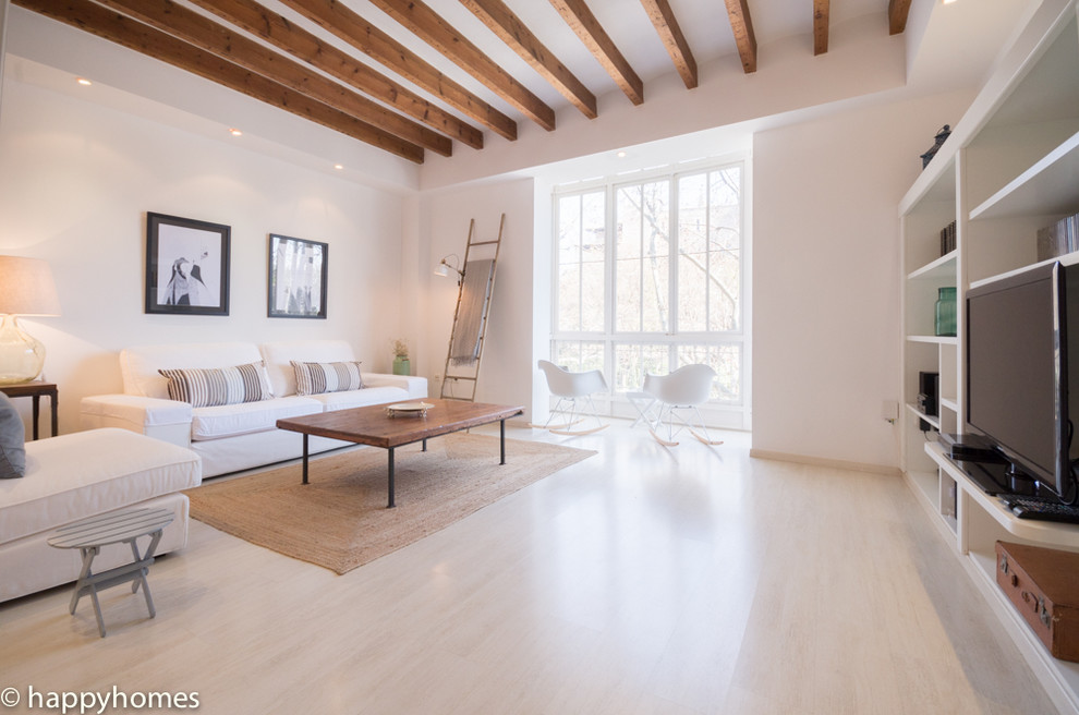 Photo of a mediterranean living room in Palma de Mallorca.
