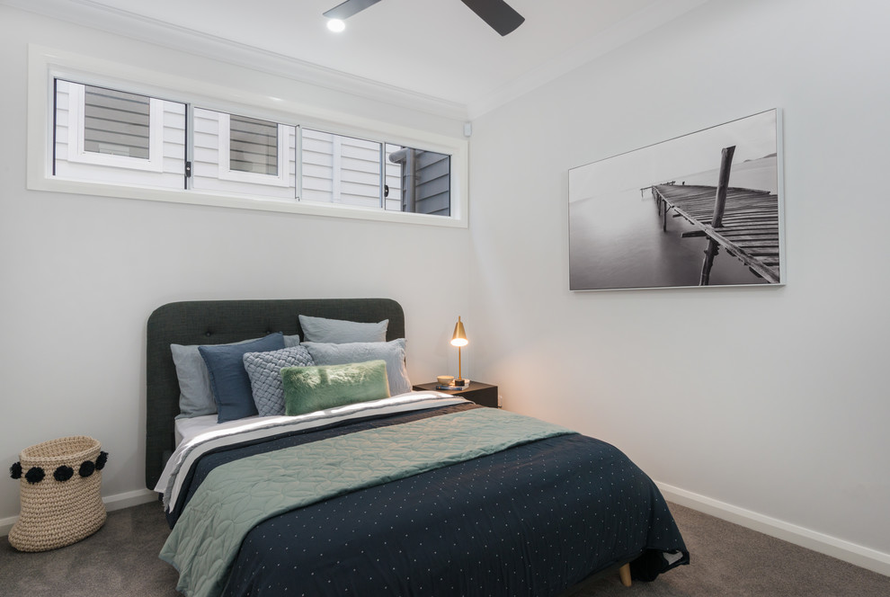 Design ideas for a modern bedroom in Brisbane.